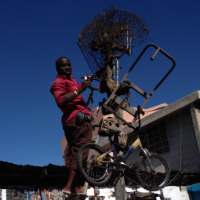 4.2.1_Haiti_Artist_on_Ladder